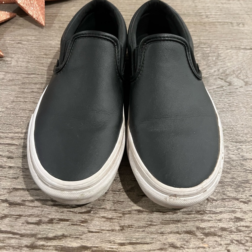 Vans Black Leather women’s 7